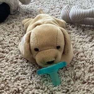 Plush Tan Dog Toy with Blue Pacifier